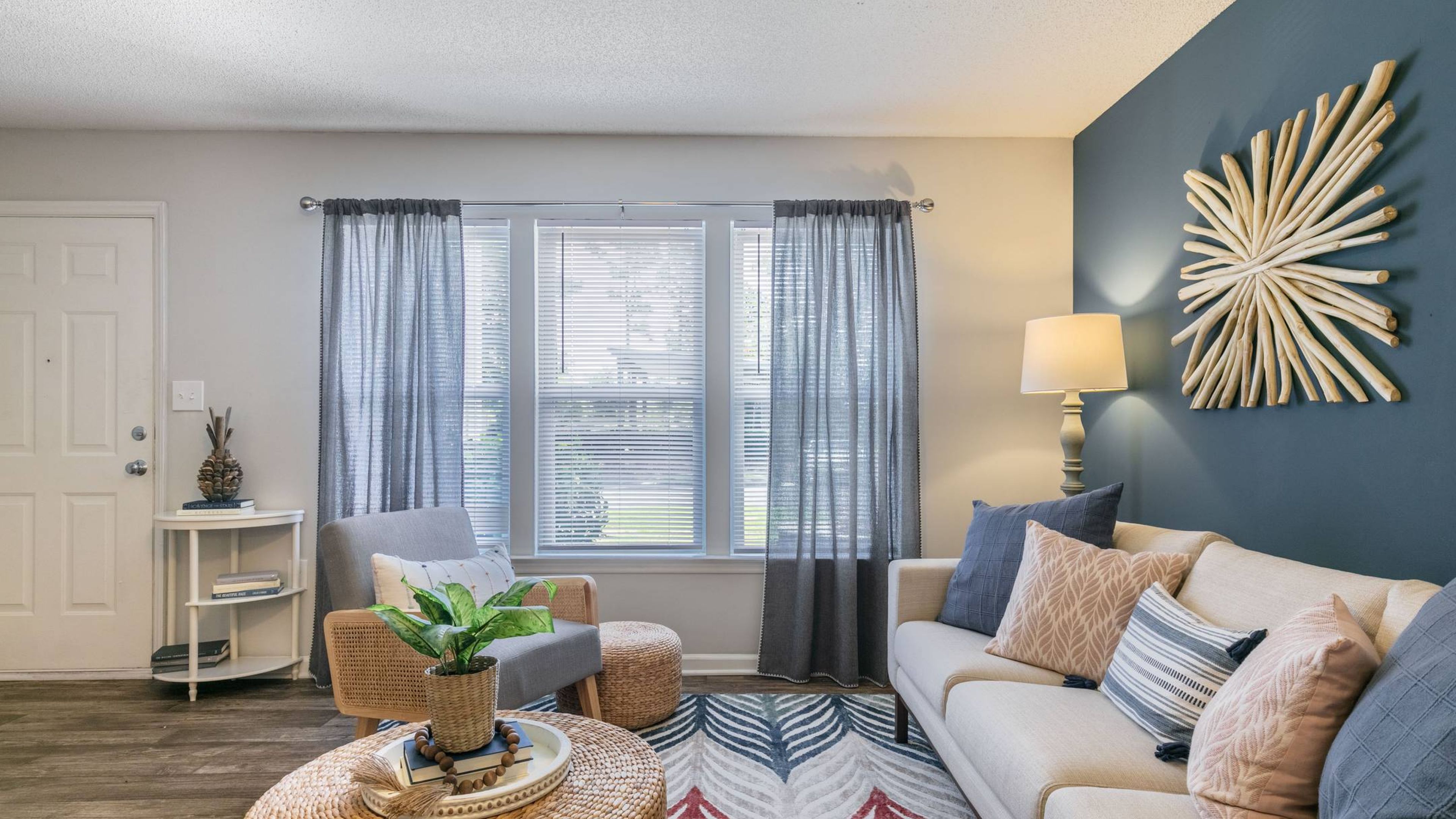 Hawthorne at New Centre apartment bedroom with coastal decor at Hawthorne at New Centre